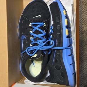 NIKE Women's Flex Supreme TR in Black/Lake Blue - Barely Volt